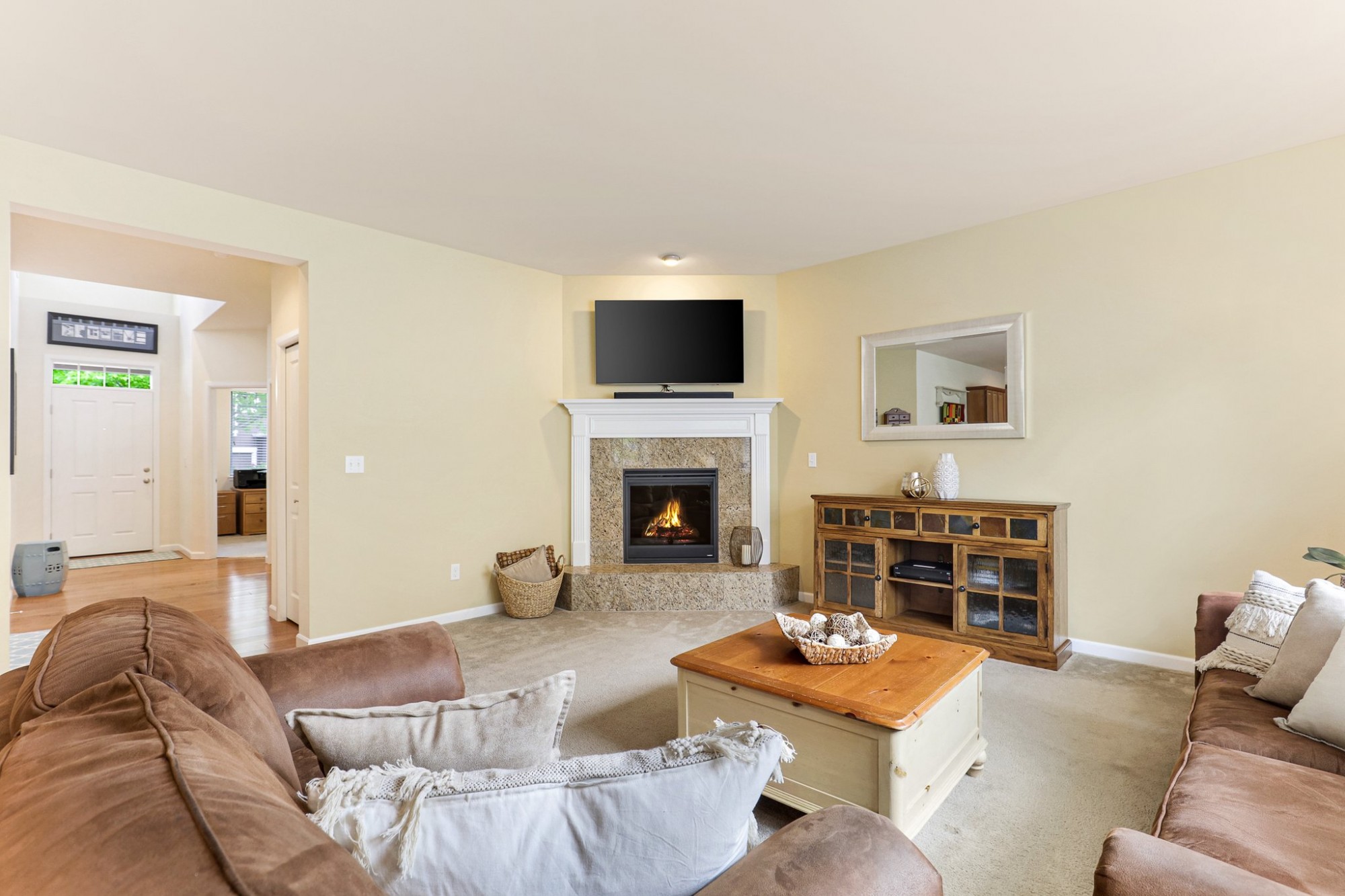 Large Great Room with  9 ft high ceilings and natural gas fireplace for those cozy days!