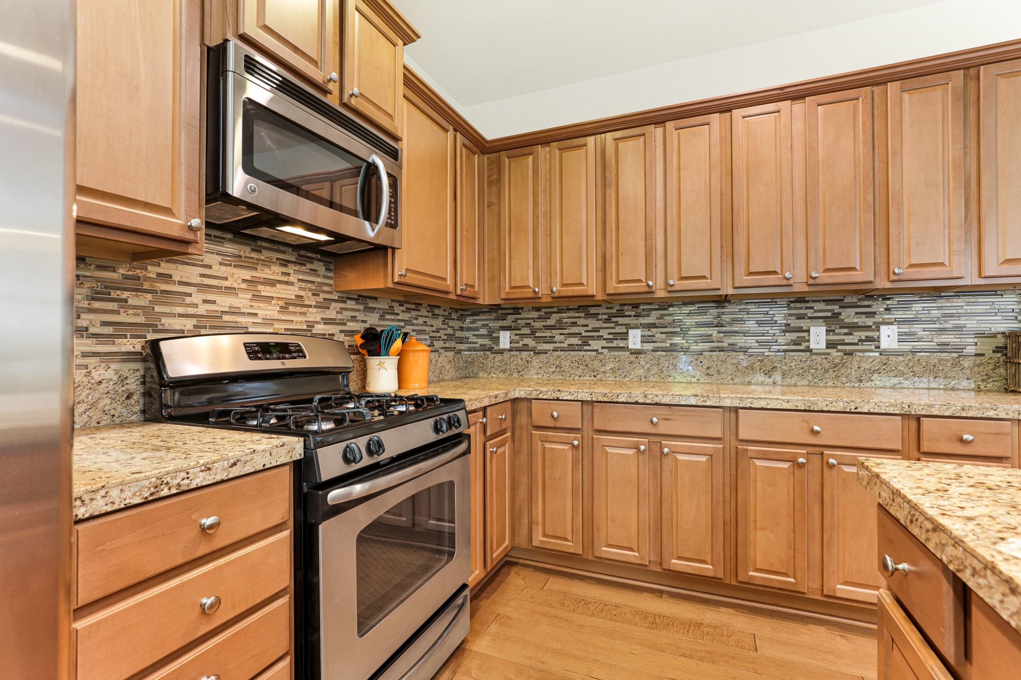 Lots of cabinetry and granite countertop space. 